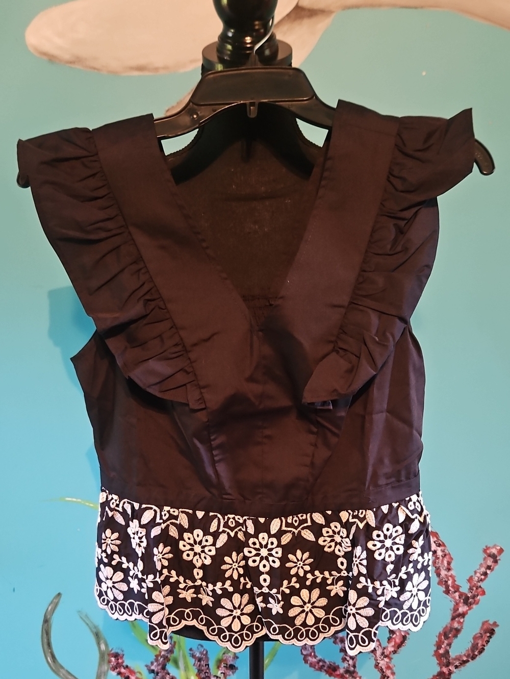 Nanette Lepore Black Sleeveless V-Neck Top with White Floral Embroidered Hem